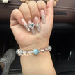Laxne Kongyulan: Magnolia Serenity Bracelet