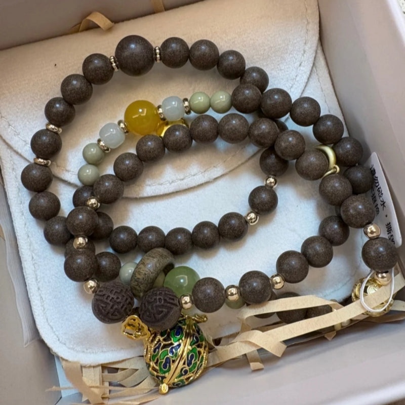 Natural herbal energy beads on Moyu Fang bracelet